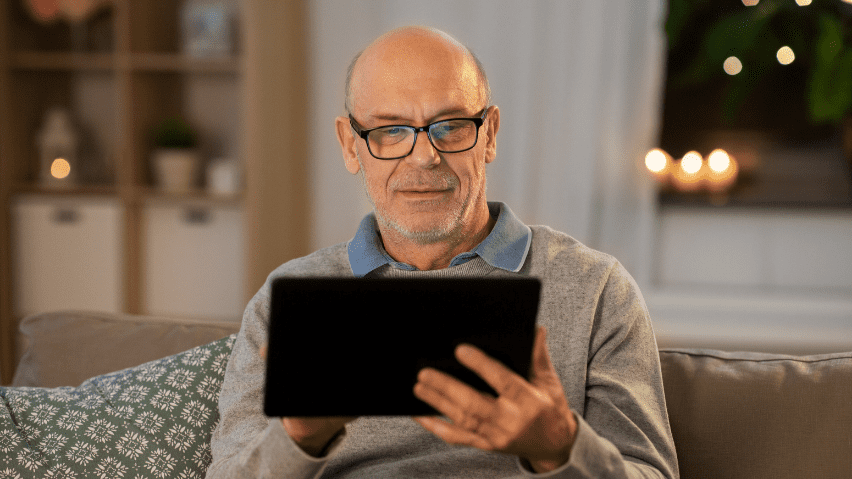 Man on tablet device