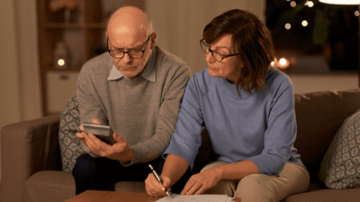 Senior couple calculating finances